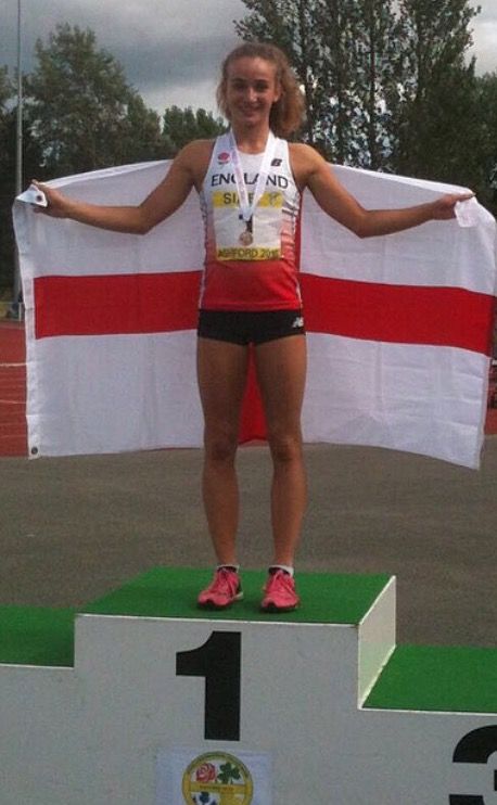 Pippa Earley on the podium in an England vest